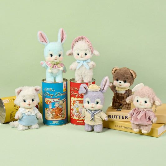 Set of plush toys in front of product packaging on a light green background