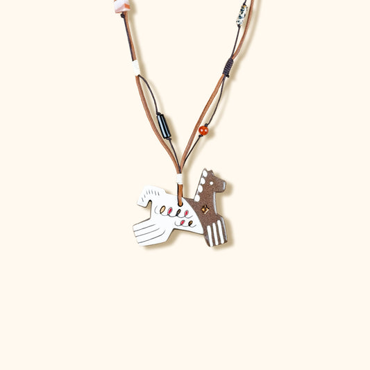 Her Market | Black Infinity Pattern Whimsical 8-Leg Pony Necklace