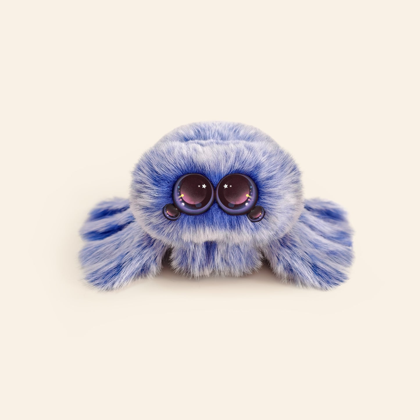 Blue plush toy with large eyes on a beige background