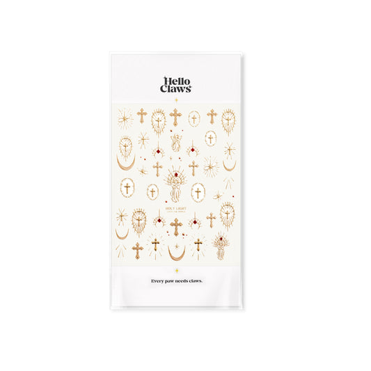 Sheet of gold temporary tattoos with various designs on a white background, branded 'Hello Clove'.